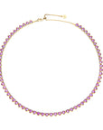 Gold tennis necklace featuring heart shaped pink CZ stones and adjustable sliding clasp