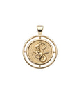 Gold coin pendant with the sea goat that represents the Capricorn zodiac sign