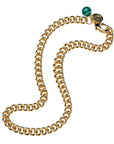 Chunky gold curb chain with malachite bead, JW tag, and oversized lobster clasp