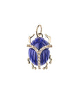 Carved lapis scarab pendant with white topaz accents and gold legs and bail