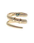 Gold ring with snake that wraps around finger and features star detail and green tourmaline accent on snake head