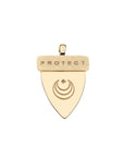 Back of gold shark tooth features moon and star logo and the word PROTECT