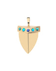 Gold shark tooth pendant featuring lapis, turquoise, and malachite accent stones