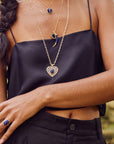 Model wearing lapis scarab ring