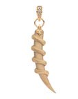 Back of gold tusk pendant features a star detail at the top