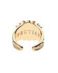 Inside of gold watchful eye ring features the word PROTECT