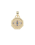 Gold octagonal pendant featuring eye design accented with blue topaz and white topaz stones
