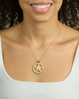 Model wearing the strong light of the ocean pendant on the classic rolo chain