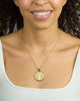 Model wearing the strong love of the sea coin on the classic rolo chain
