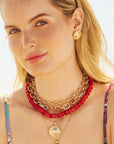 Model wearing the strong apollo stud earrings