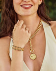 Model wearing the Lucky bonne chance cutout cuff and curb chain lariat with the lucky bonne chance coin