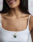 Model wearing the Hope Acorn pendant on the adjustable snake chain