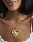 Model wearing the chunky treasure trove heart pendant on the drawn link chain