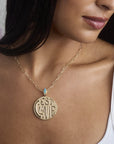 Model wearing the Jane Win x La Vie Signature coin pendant