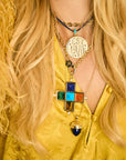 Model wearing various Jane Win x La Vie pendants and chains