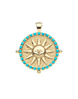Gold coin pendant with vintage inspired sun face in shiny gold on matte gold background with border of turquoise stones