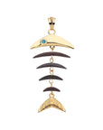 Fish skeleton pendant features gold head and tail with wood bones and blue topaz eye