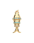 Gold articulated fish pendant accented with white topaz, aquamarine, and blue topaz stones