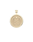 Back of gold sun coin pendant features moon and star logo and the word STRONG