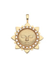 Gold sun face pendant featuring mother of pearl detail on border