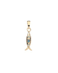 Gold fish pendant featuring blue topaz and white topaz stones