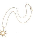 Gold supernova pendant on the snake chain