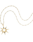 Gold supernova pendant on the satellite chain