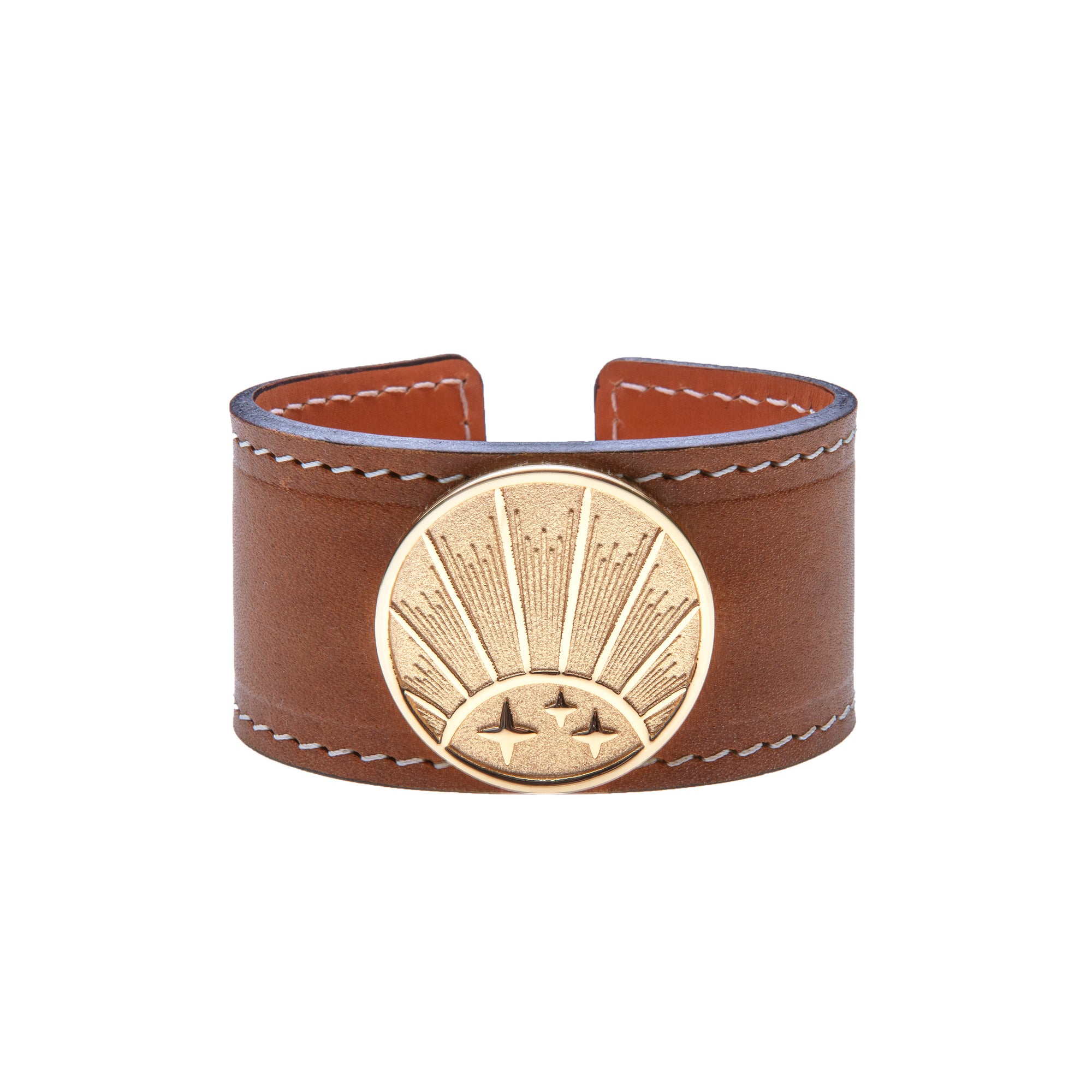 Brown leather cuff bracelet featuring gold coin with rising sun design
