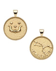 Gold small Taurus coin pendant with bull horns and star details on one side and Taurus constellation with "Taurus" written underneath on the other side