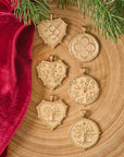 Gold coin and heart pendants