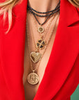 Layered gold necklaces