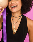 Model wearing lucky wish on star pendant