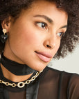 Model wearing carry your heart drop earrings