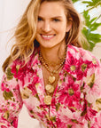 Model wearing gold layered hope pendants