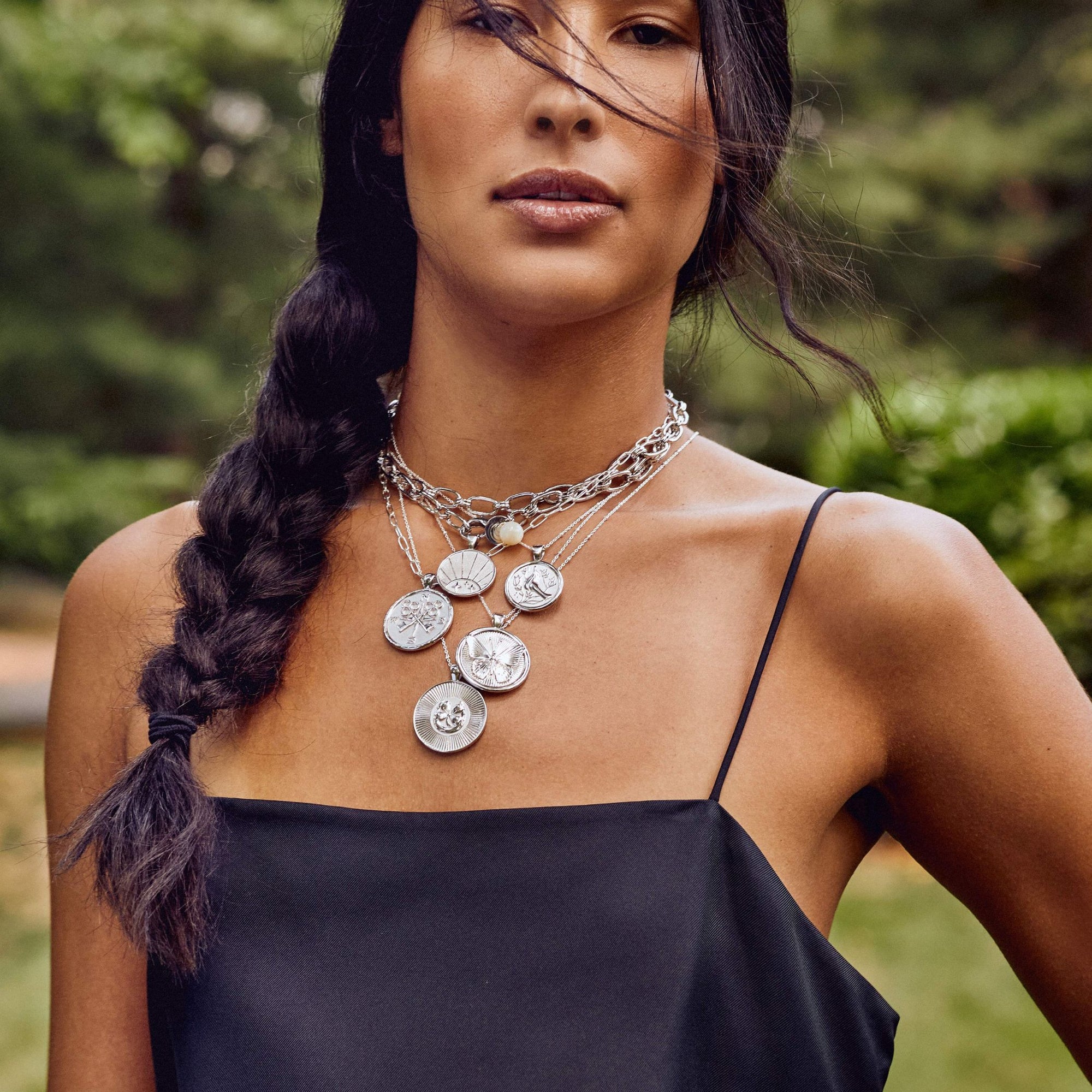 Silver Coin Necklaces Layered on Model