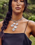 Silver Coin Necklaces Layered on Model