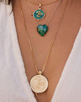 Gold Coin Necklaces Layered on Model