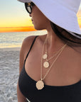 Gold Coin Necklaces Layered on Model