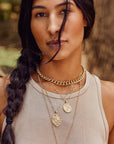 Gold Coin Necklaces Layered on Model