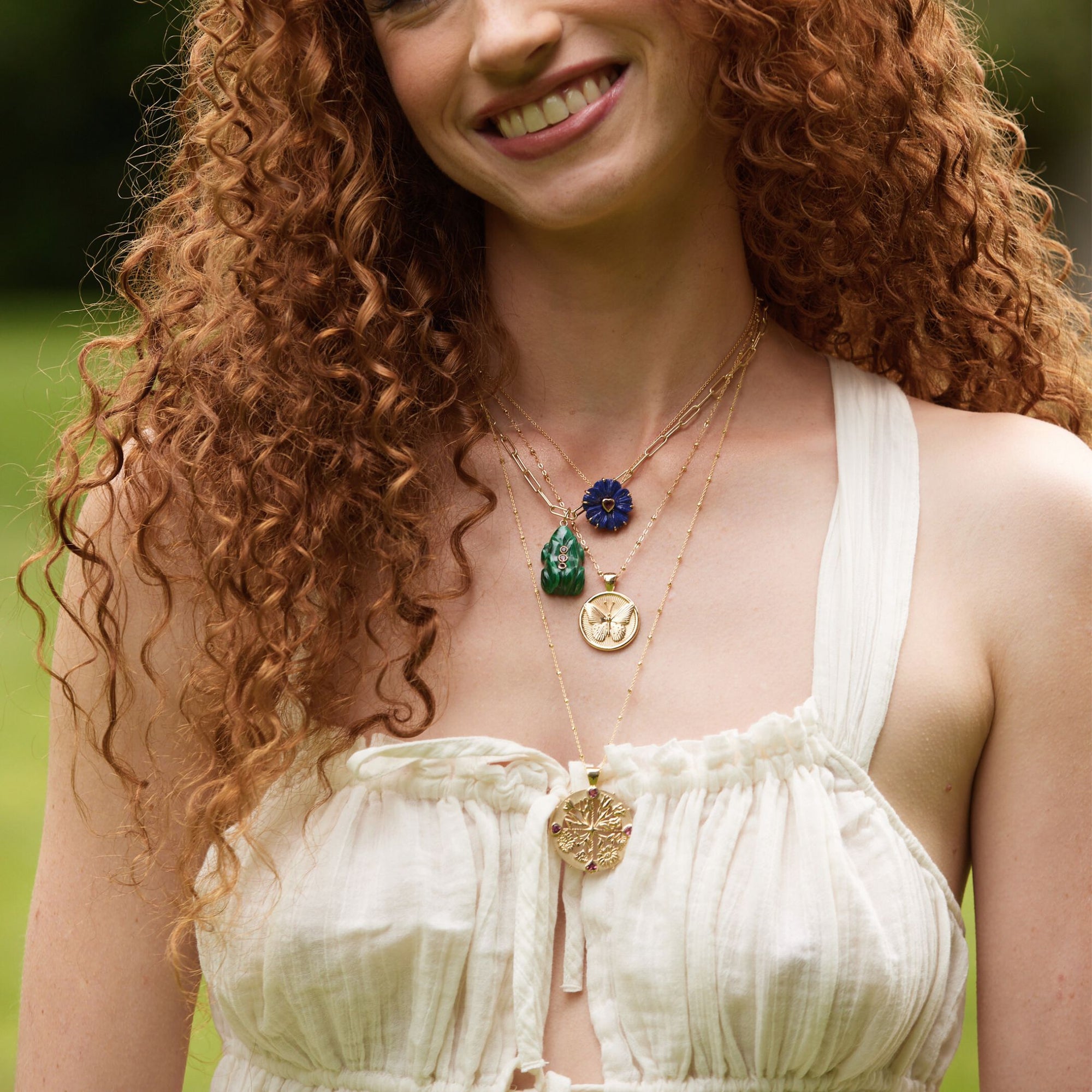 Gold Coin Necklaces Layered on Model