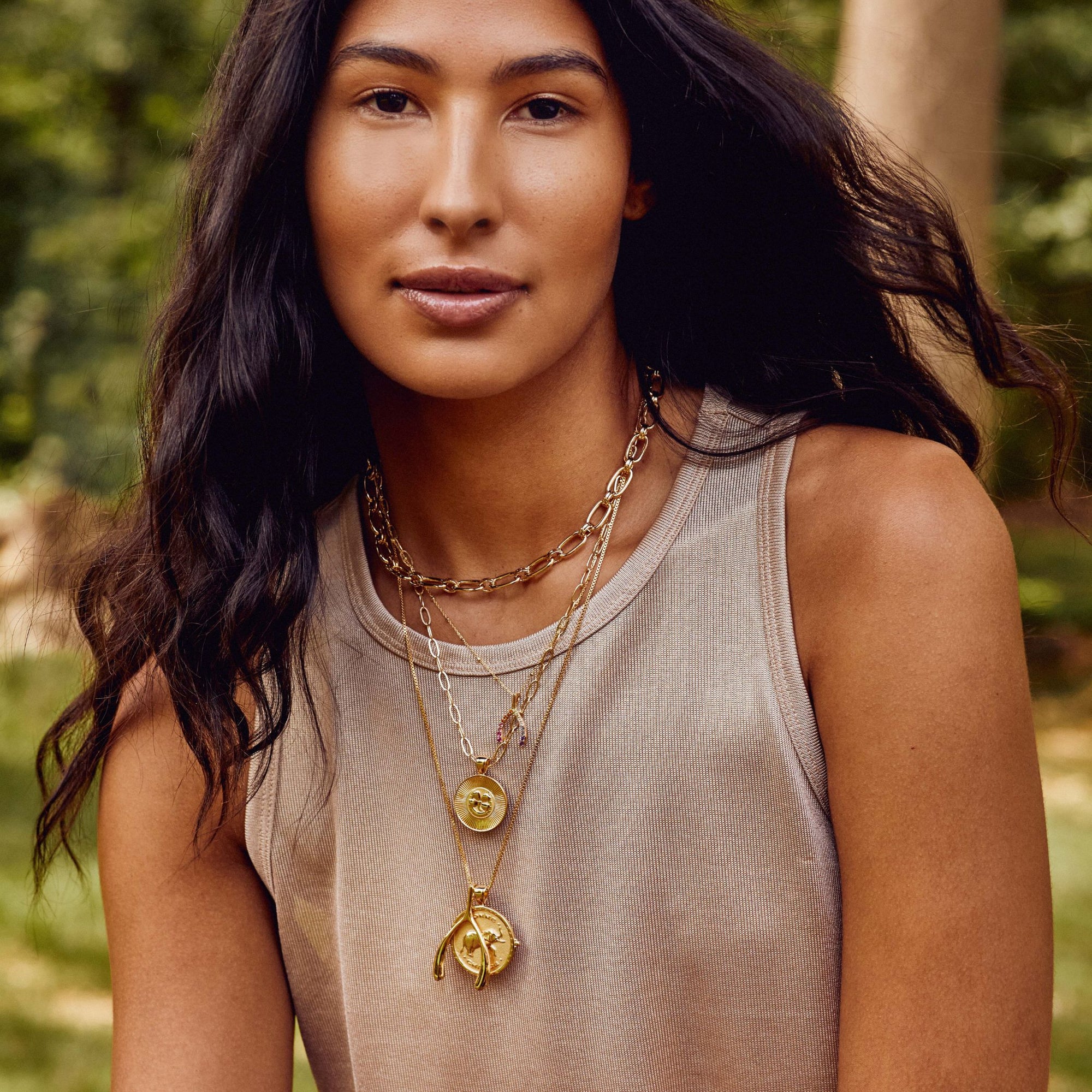 Gold Coin Necklaces Layered on Model