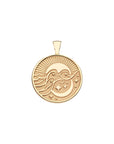 Gold coin pendant features design with sun, ocean waves, moon and stars