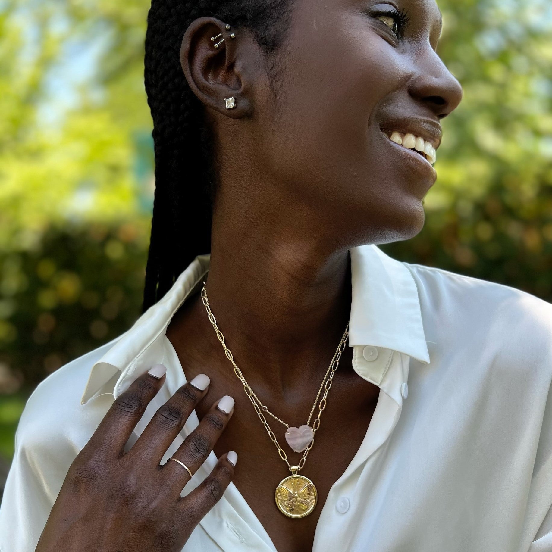Gold Coin Necklaces Layered on Model