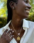 Gold Coin Necklaces Layered on Model