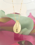Raindrop pendant on beaded satellite chain