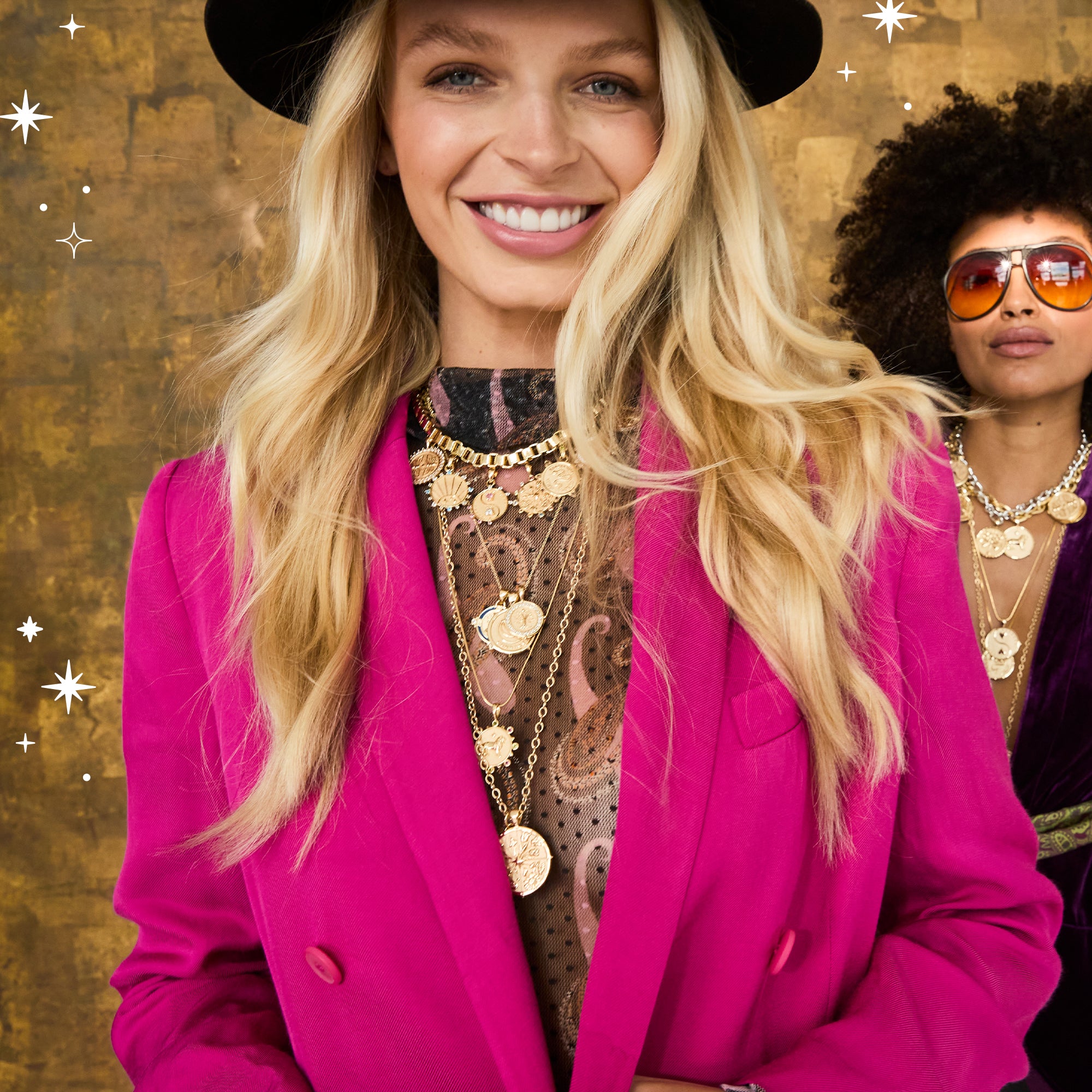two jane win models wearing multiple coin pendants