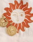 Stylized shot of forever sundial coin and forever sundial cutout coin