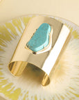 Stylized shot of lucky turquoise nugget cuff