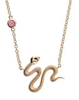 Gold snake pendant with pink tourmaline accent on chain