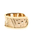 Side view of gold rising sun cuff shows crescent moon and star details